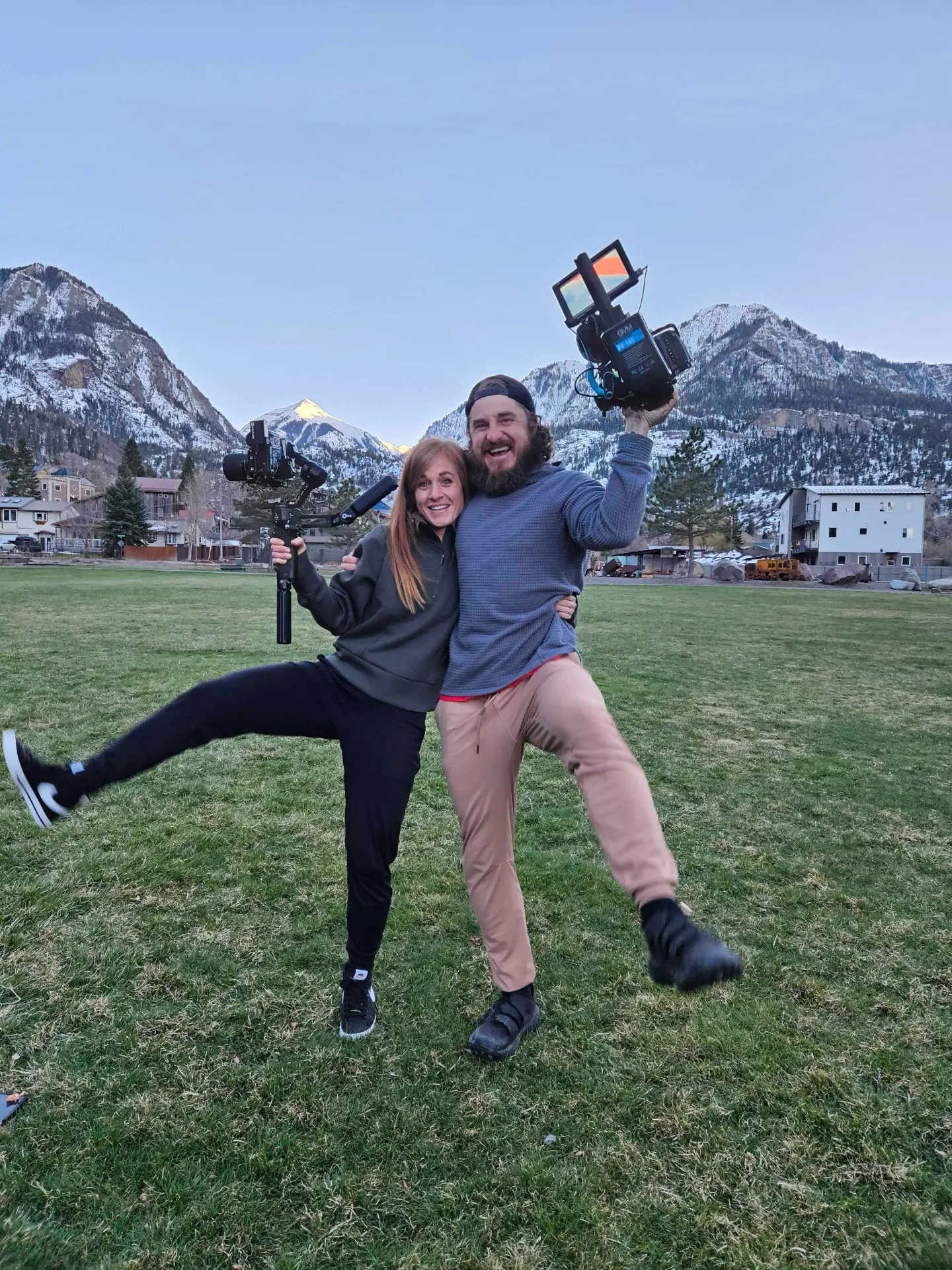 Rachael and her co-founder on set with cameras in the mountains